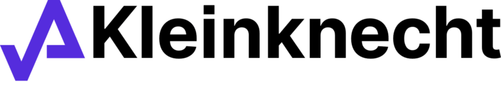 A vertical purple line with a sharp angle on the left, resembling part of a stylized 'V' or a checkmark, followed by the word "Amplitude" in black letters.