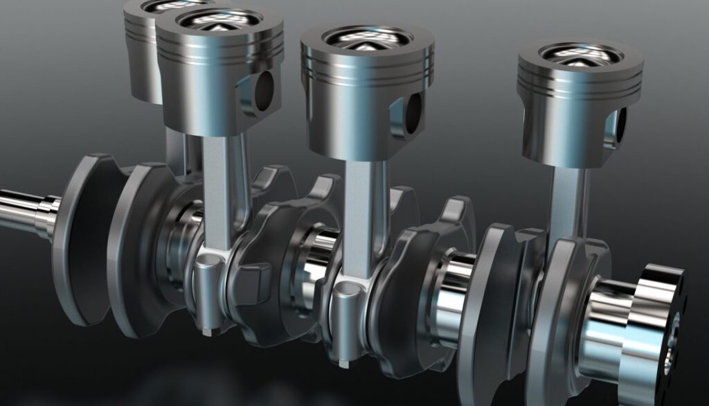 A set of pistons on a black background.