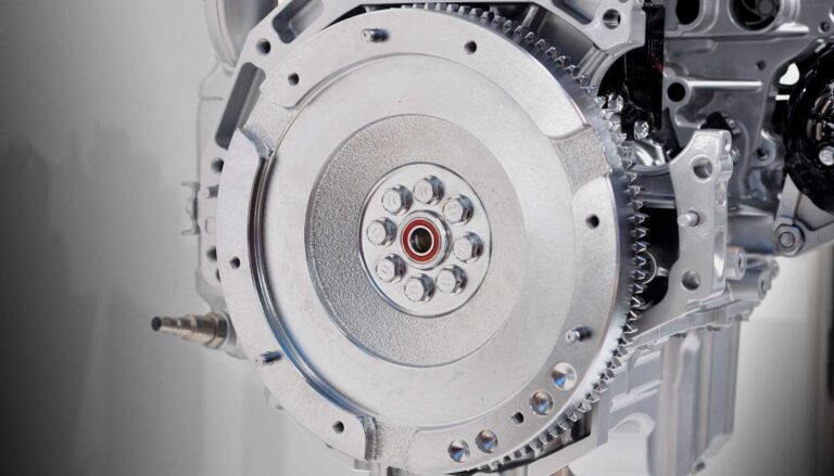 A car engine is shown on a white background.