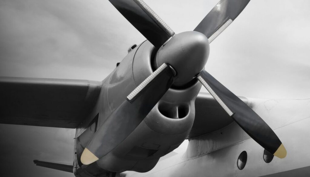 A black and white photo of an airplane propeller.
