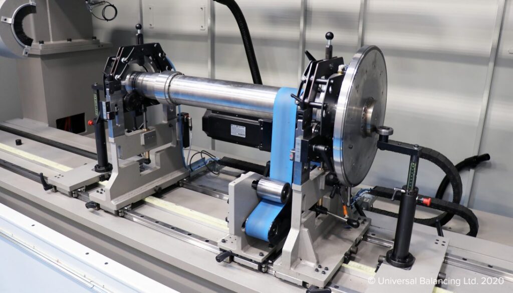 A machine is being used to make a piece of metal.