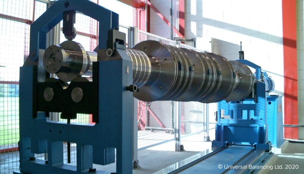 A machine with a large metal tube on it.