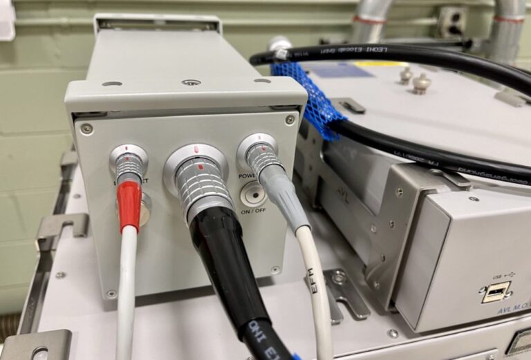 A device with two wires connected to it.