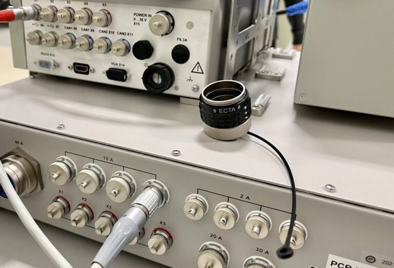 A machine with a camera attached to it.