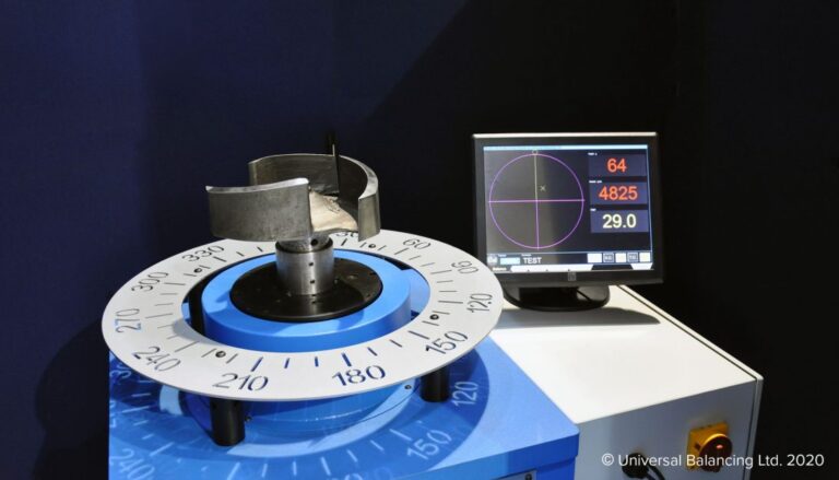 A blue and white machine with a clock on it.