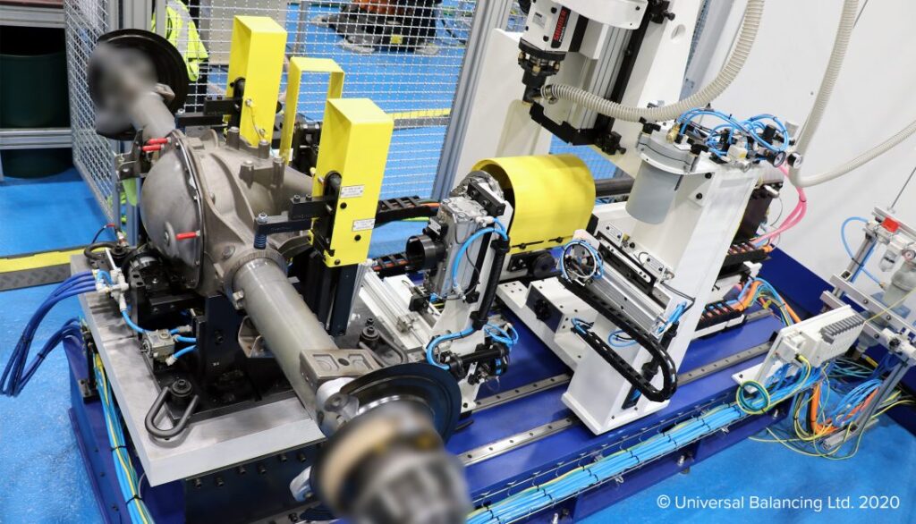 A machine is working on a machine in a factory.