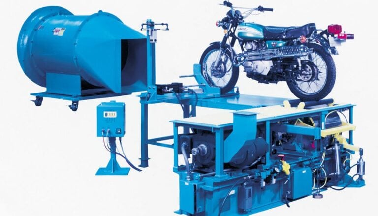 A blue machine with a motorcycle on it.