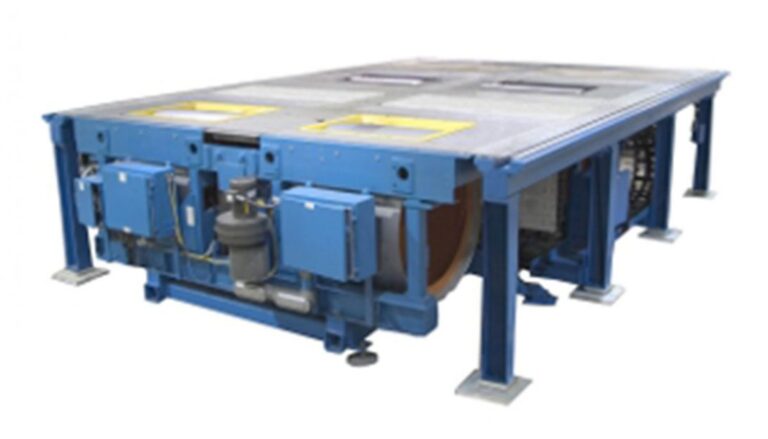 A machine with a blue table on top of it.