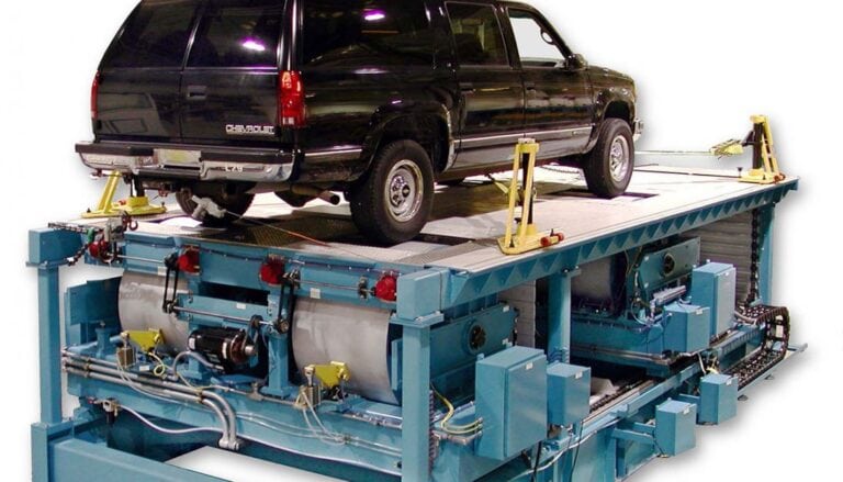 A black car on a platform.