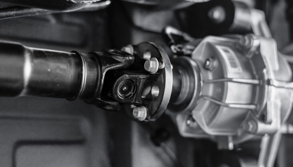 A black and white photo of a car's engine.