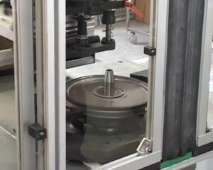 Automatic flexplate and flywheel balancing machine